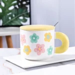 Ceramic Floral Design Yellow Mug With Lid And Spoon1