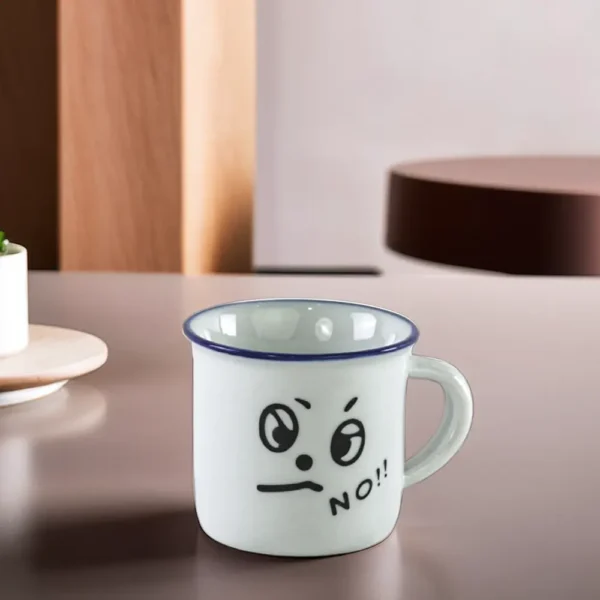 Ceramic angry face design blue small coffee cup1