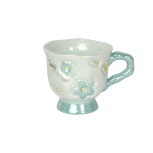 Ceramic flower design blue mug with handle