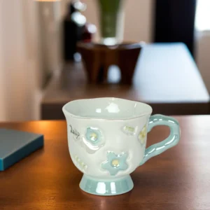 Ceramic flower design blue mug with handle1