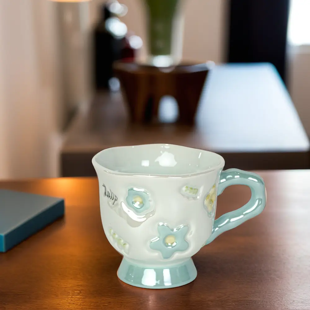 Ceramic flower design blue mug with handle1