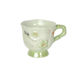 Ceramic flower design green mug with handle