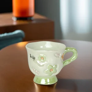 Ceramic flower design green mug with handle1