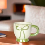 Ceramic-Ribbon-Design-Green-Mug-with-Handle1 Ceramic ribbon design green mug with handle1
