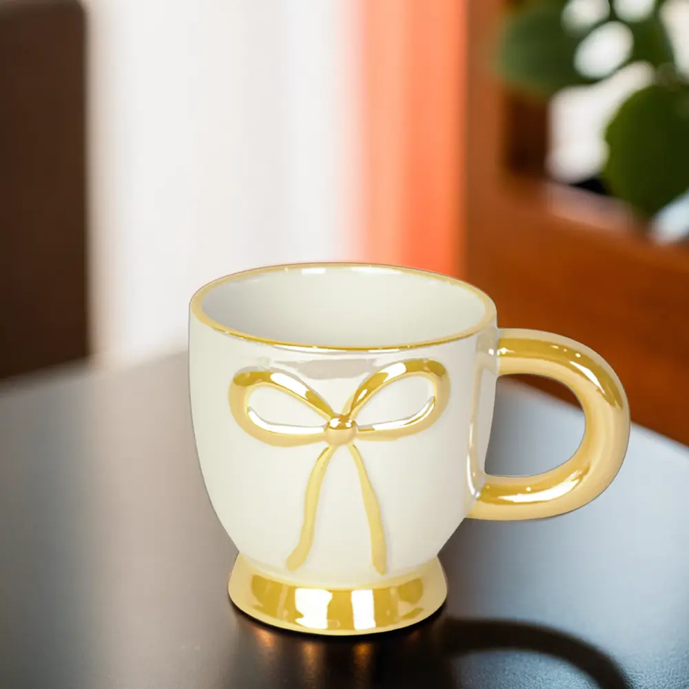 Ceramic ribbon design yellow mug with handle1