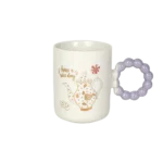 Ceramic white mug with purple bubble design handle