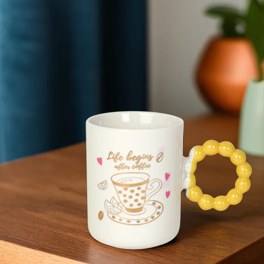 Ceramic white mug with yellow bubble design handle1