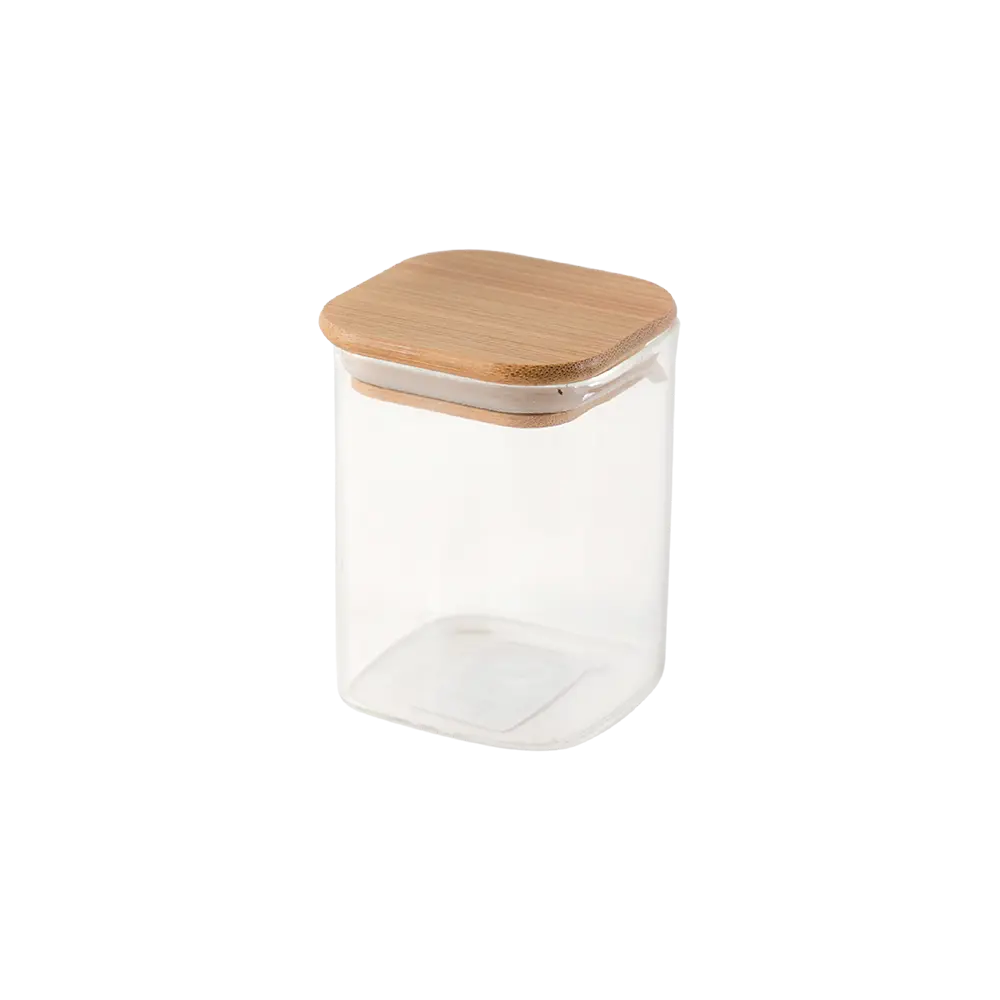 Small glass jar with wooden lid
