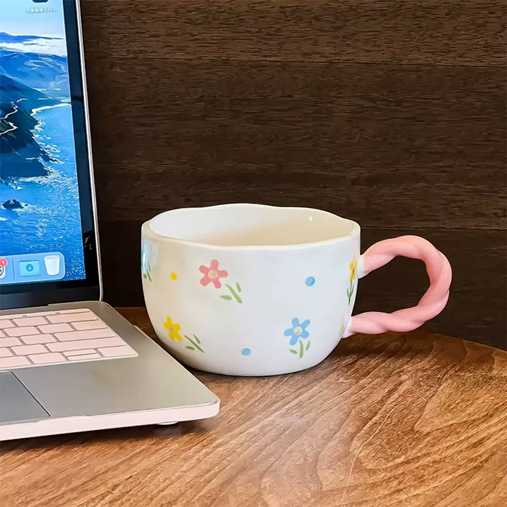 Ceramic floral design mug with pink handle1