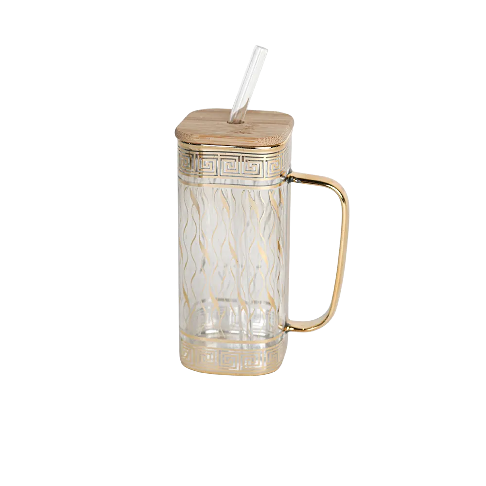 Glass golden patterend design mug with golden handle