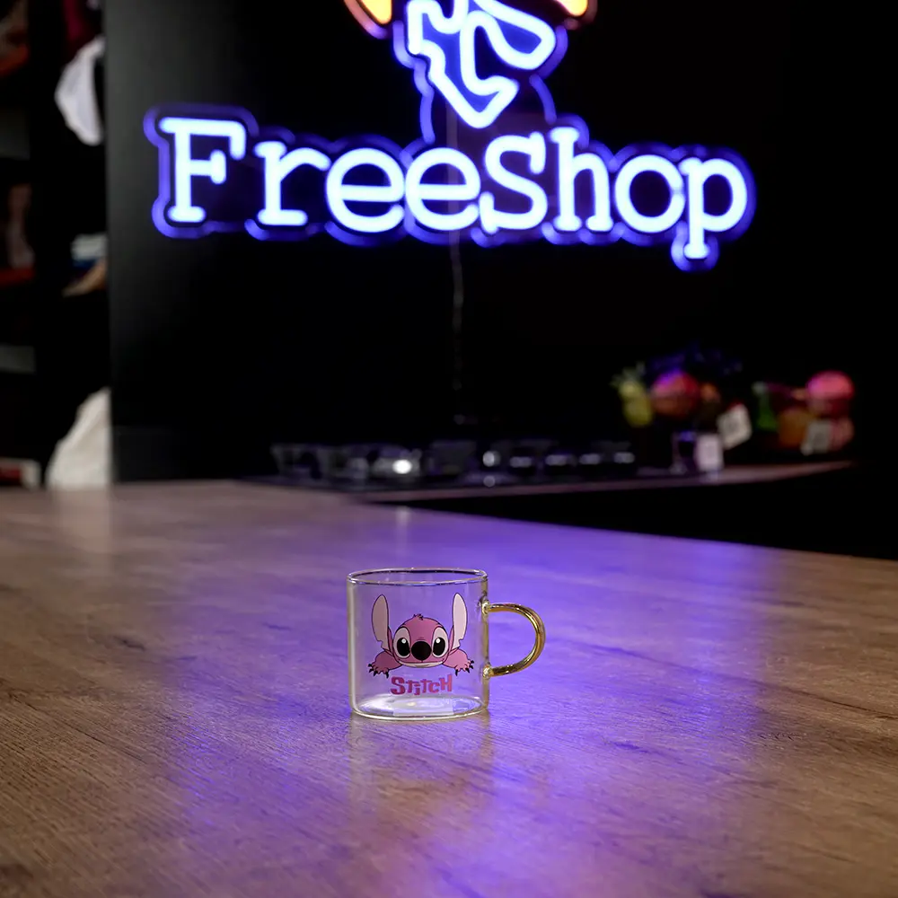 Small glass pink stitch design coffee cup with yellow handle1