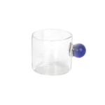 Small glass transparent coffee cup with blue ball handle