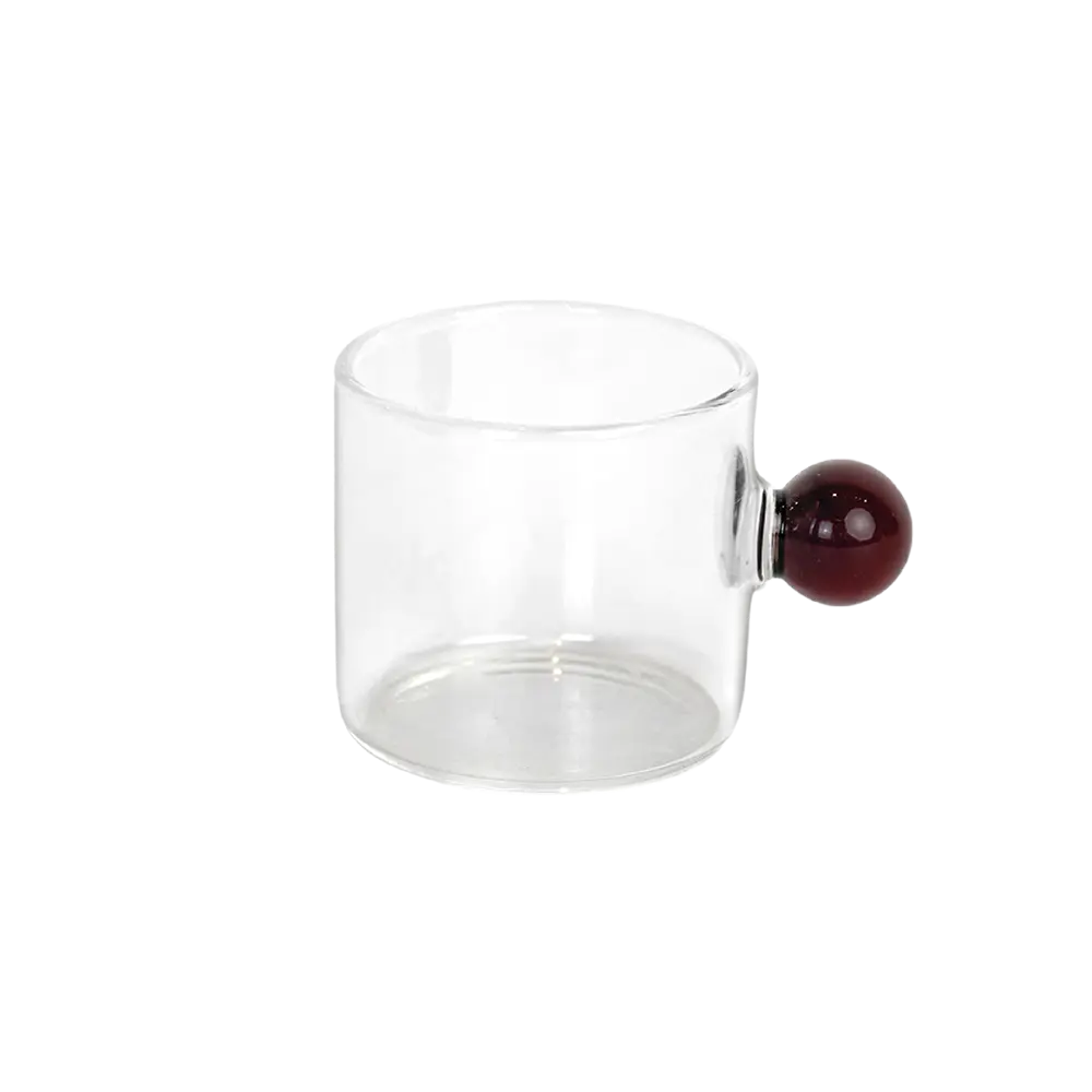 Small glass transparent coffee cup with red ball handle
