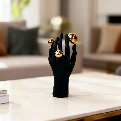 Black Abstract Hand Sculpture with Gold Orbs1