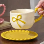 Ceramic Coquette Bow Design Yellow Mug with Saucer1