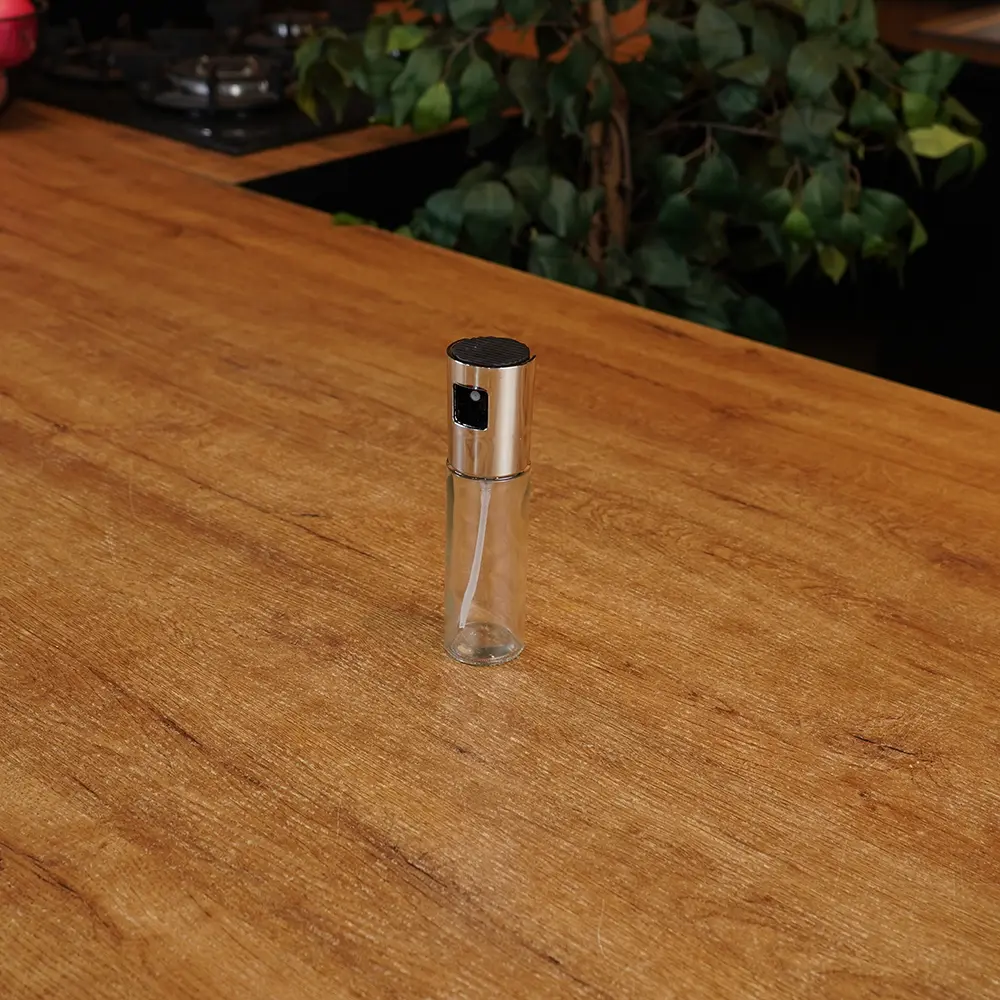 Glass 100ml Oil Spray Bottle with Silver Lid1